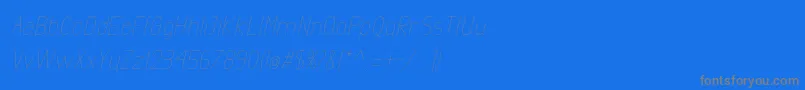 Czcionka ExactaLightItalic – szare czcionki na niebieskim tle