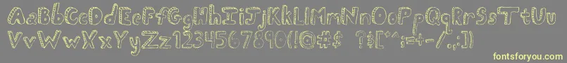 More about FhScribble Font FhScribble Font – Yellow Fonts on Gray Background