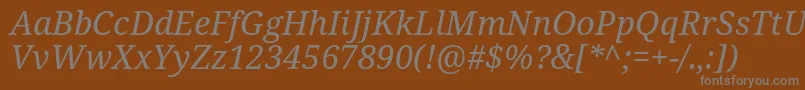 Notoserif Italic-Schriftart – Graue Schriften auf braunem Hintergrund