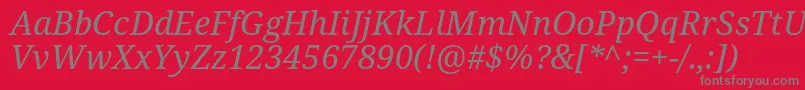 Notoserif Italic-Schriftart – Graue Schriften auf rotem Hintergrund