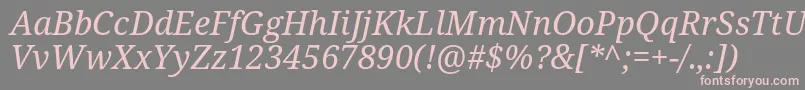 Notoserif Italic-fontti – vaaleanpunaiset fontit harmaalla taustalla