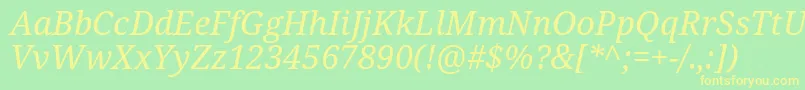 Czcionka Notoserif Italic – żółte czcionki na zielonym tle