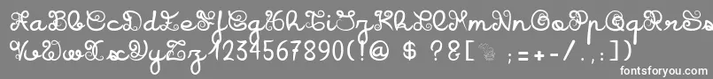 フォントIcarusKharma – 灰色の背景に白い文字