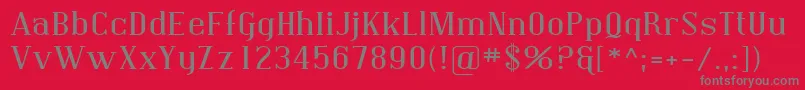 Sfcovingtonexp-Schriftart – Graue Schriften auf rotem Hintergrund