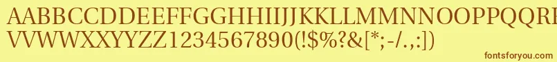 フォントUtopiaTitlingCapitals – 茶色の文字が黄色の背景にあります。