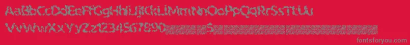 Indiantiger-Schriftart – Graue Schriften auf rotem Hintergrund