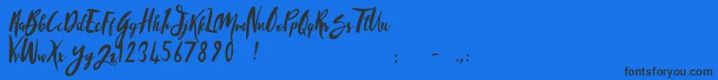 SandyliteRegular Font – Black Fonts on Blue Background