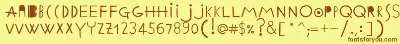 Czcionka EthnicabcRegularWebfont – brązowe czcionki na żółtym tle