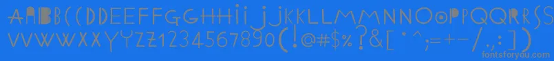 Fonte EthnicabcRegularWebfont – fontes cinzas em um fundo azul