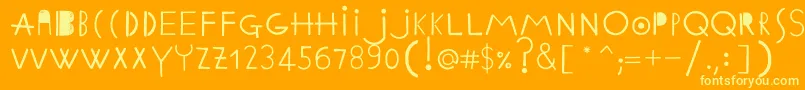 フォントEthnicabcRegularWebfont – オレンジの背景に黄色の文字