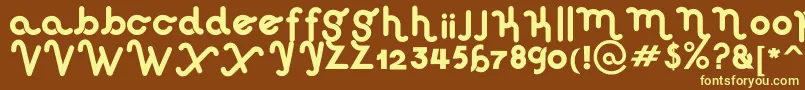 HausSweetHausRounded-fontti – keltaiset fontit ruskealla taustalla