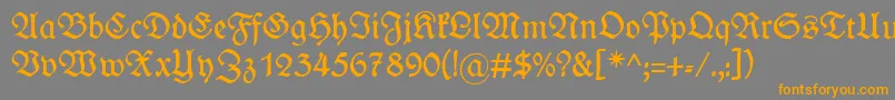 フォントWieynkfraktur – オレンジの文字は灰色の背景にあります。