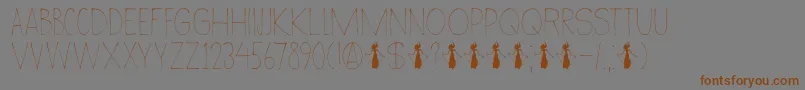 DkWayang-Schriftart – Braune Schriften auf grauem Hintergrund