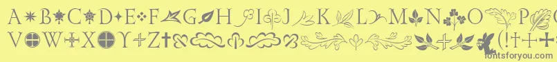 GoldencockerelinitornitcTt-Schriftart – Graue Schriften auf gelbem Hintergrund