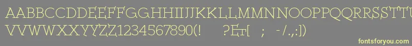Ethserifethon-Schriftart – Gelbe Schriften auf grauem Hintergrund