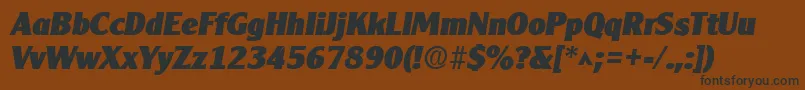 ClearlyGothicHeavyItalic-fontti – mustat fontit ruskealla taustalla
