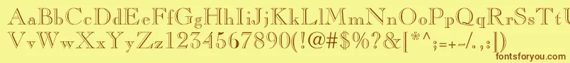フォントNelsieopenface – 茶色の文字が黄色の背景にあります。