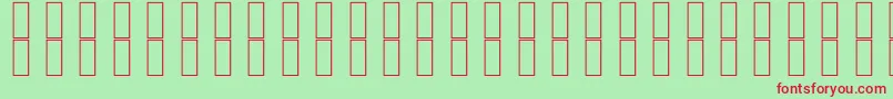 SkrHead2Outlined-fontti – punaiset fontit vihreällä taustalla