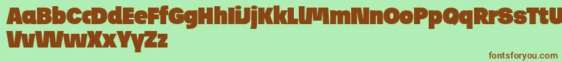 JosefReducedUltra Font – Brown Fonts on Green Background