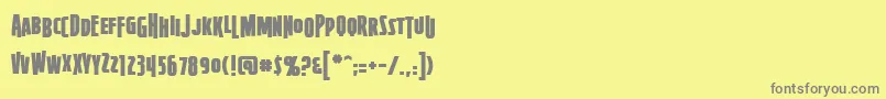 フォントFirepowerbb – 黄色の背景に灰色の文字