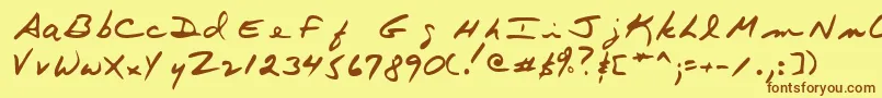 フォントTerryshand – 茶色の文字が黄色の背景にあります。