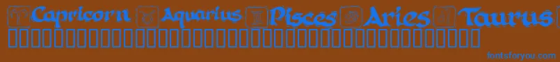KrAstro1-Schriftart – Blaue Schriften auf braunem Hintergrund