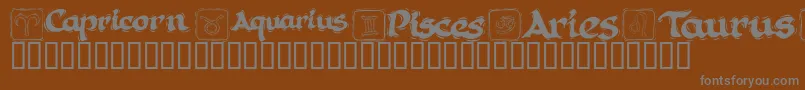 KrAstro1 Font – Gray Fonts on Brown Background