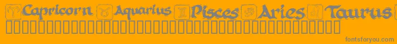 KrAstro1-Schriftart – Graue Schriften auf orangefarbenem Hintergrund