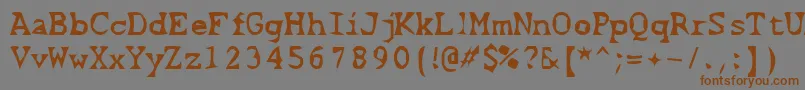 Шрифт ScissorCuts2 – коричневые шрифты на сером фоне