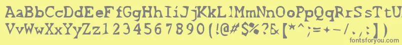 Шрифт ScissorCuts2 – серые шрифты на жёлтом фоне