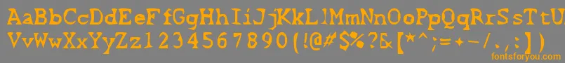 ScissorCuts2-Schriftart – Orangefarbene Schriften auf grauem Hintergrund