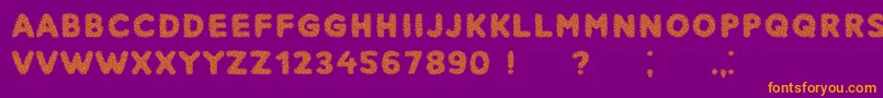 Narcissus Font – Orange Fonts on Purple Background