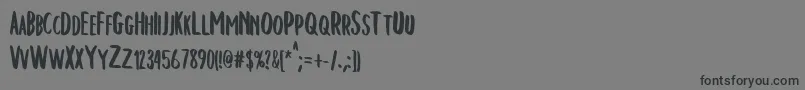 ChelseaBrush-Schriftart – Schwarze Schriften auf grauem Hintergrund