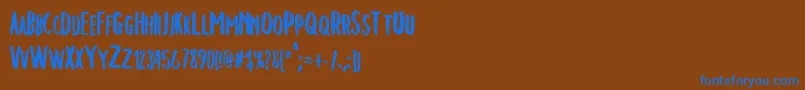 フォントChelseaBrush – 茶色の背景に青い文字