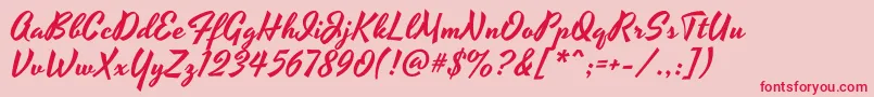 YesteryearRegular Font – Red Fonts on Pink Background