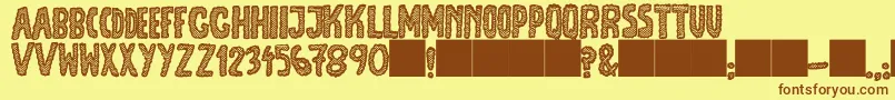 JmhEscamasBlack-fontti – ruskeat fontit keltaisella taustalla