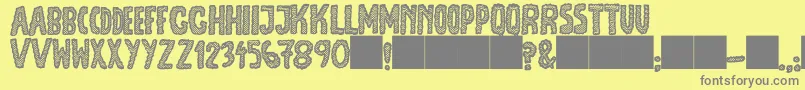 JmhEscamasBlack Font – Gray Fonts on Yellow Background