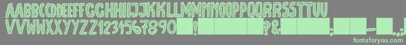 フォントJmhEscamasBlack – 灰色の背景に緑のフォント