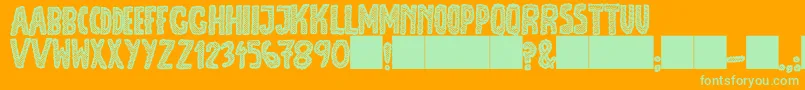 JmhEscamasBlack Font – Green Fonts on Orange Background