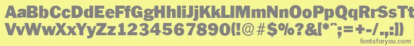 PlymouthserialBlackRegular-fontti – harmaat kirjasimet keltaisella taustalla
