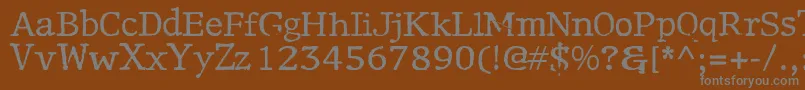 Motley-fontti – harmaat kirjasimet ruskealla taustalla
