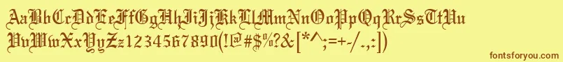 フォントBlissNormal – 茶色の文字が黄色の背景にあります。