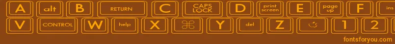 Czcionka KeyboardKeysexExpanded – pomarańczowe czcionki na brązowym tle