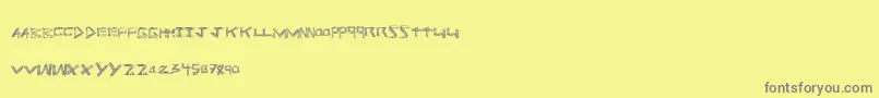 Prisonbreak-fontti – harmaat kirjasimet keltaisella taustalla