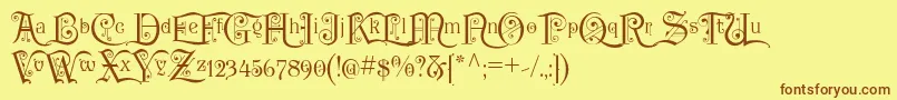 フォントP22KilkennyInitialCap – 茶色の文字が黄色の背景にあります。