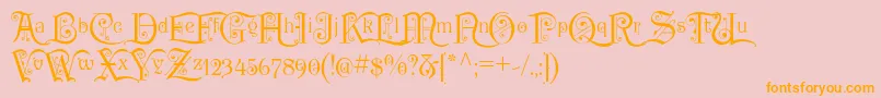 フォントP22KilkennyInitialCap – オレンジの文字がピンクの背景にあります。