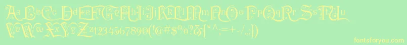 フォントP22KilkennyInitialCap – 黄色の文字が緑の背景にあります