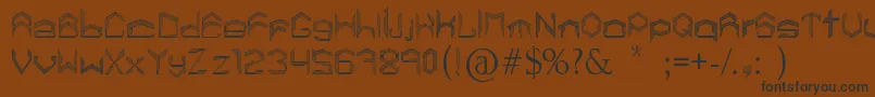 フォントLisboaCalatravaType – 黒い文字が茶色の背景にあります