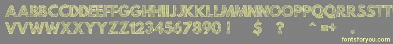 Czcionka MildLifeTexturedPersonalUse – żółte czcionki na szarym tle