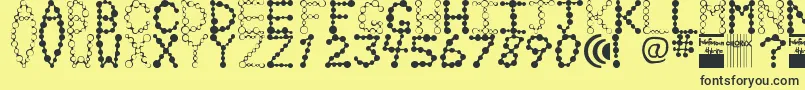 Chlorix-Schriftart – Schwarze Schriften auf gelbem Hintergrund